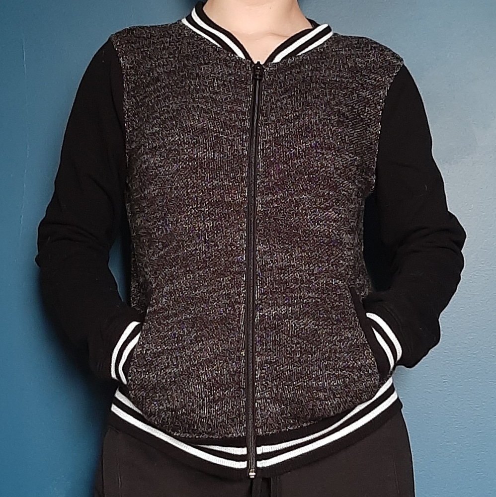 Black and grey hoodless school jacket